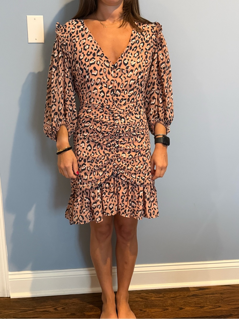 Leopard rouched dress. Worn once. 3/4 sleeves. Deep V neck. Zipper back. Lined.